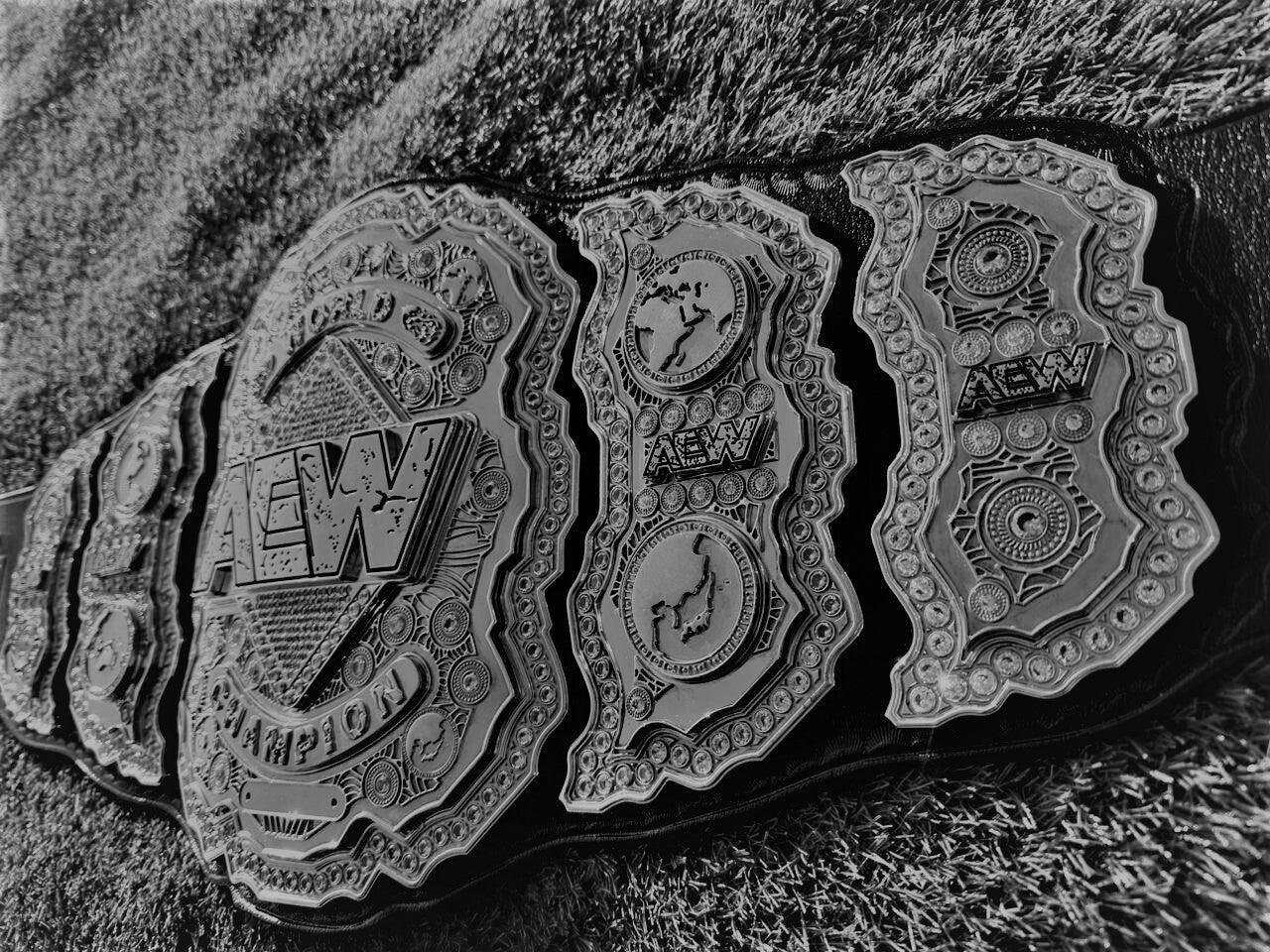zb_000001_b40c2285_AEWCNC14_59544dc7-44a3-44f6-870c-5cf02217a86e AEW 24k Gold Name Plate - Image 1